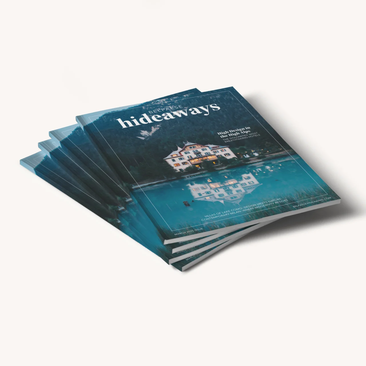 Stack of travel magazines titled 'Hideaways' with photography featuring a house on a lake.