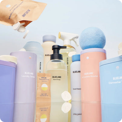 A low angle studio shot of various Blueland products, artfully arranged.