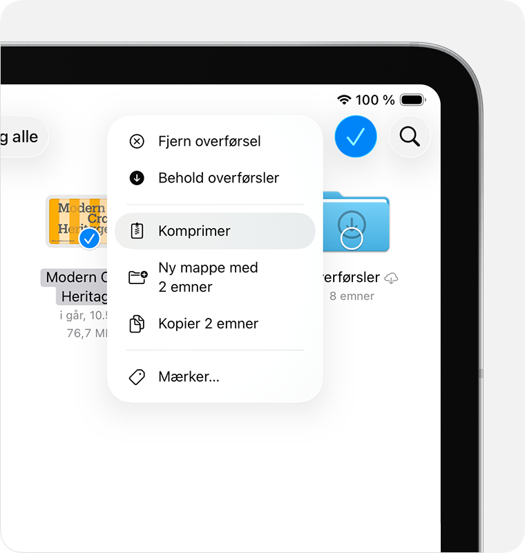 I iPadOS 26 vises Komprimer i den menu, der vises, når du trykker på knappen Mere.