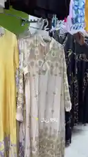 Explore a beautiful collection of traditional dresses at New A'Sharqiyah. This video showcases intricately designed long gowns with elegant embroidery and patterns, perfect for special occasions. See the variety and craftsmanship of these stunning outfits. by @alnuairiyah1 with original sound