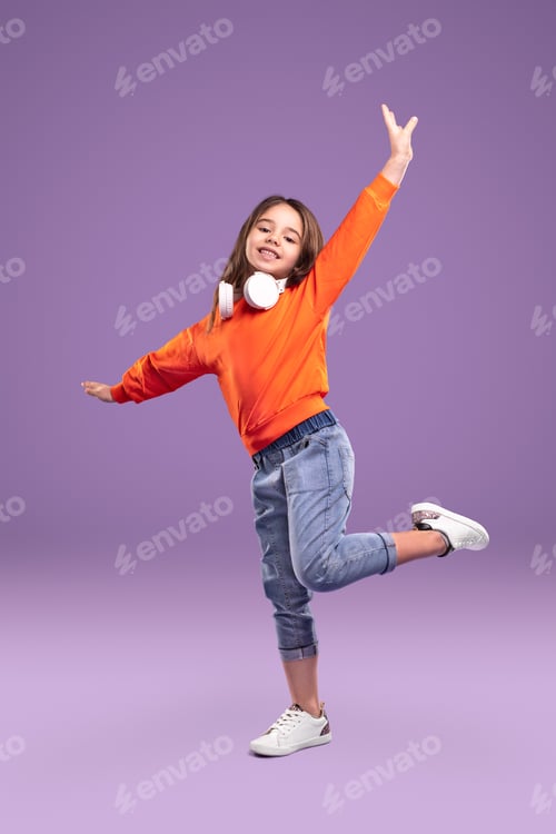 Preview: Joyful hipster girl with headphones