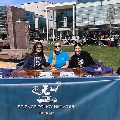 Order SciPolDetroit merch!