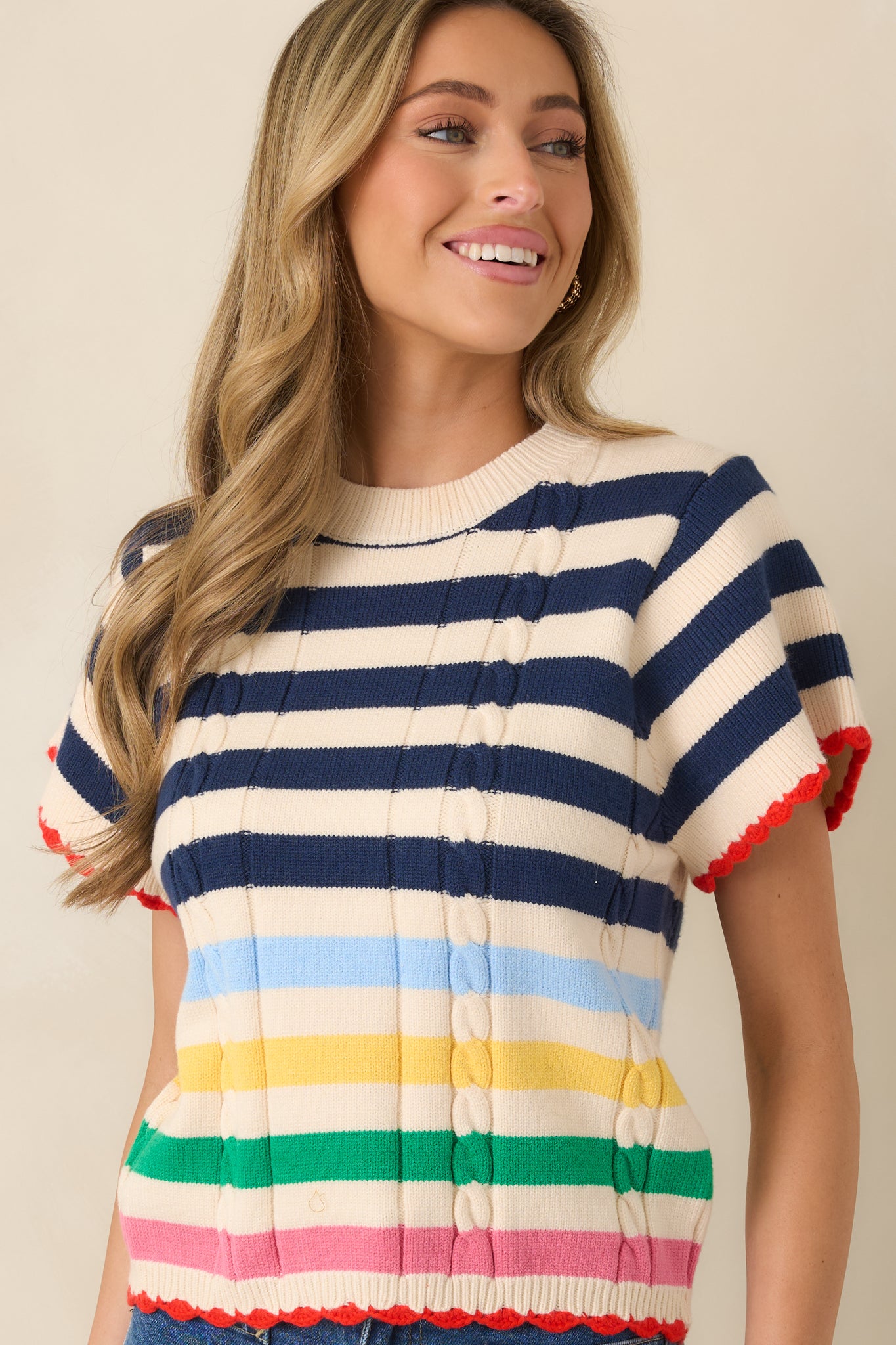 Navy striped knit fabric with textured vertical stitch detailing.